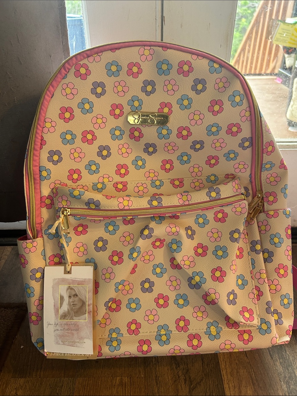 Pink Floral Pattern Women's Backpack with Gold Accent